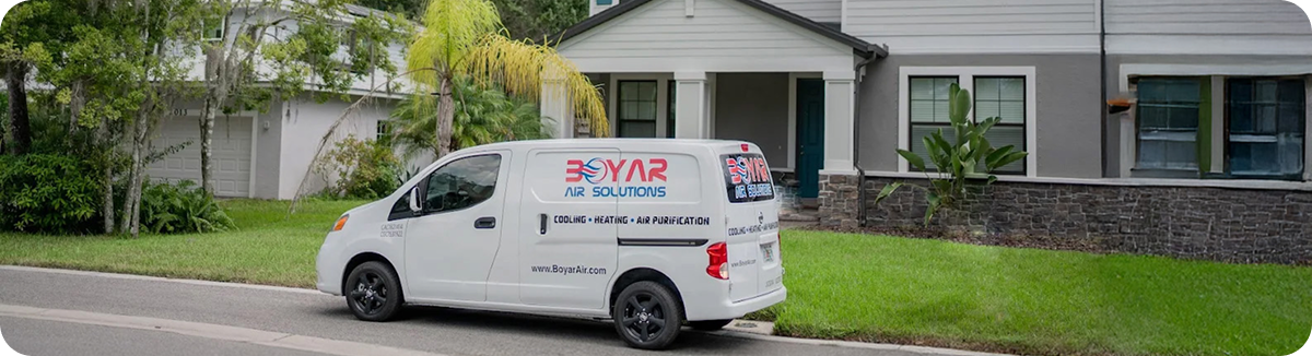 Boyar company van in front of house
