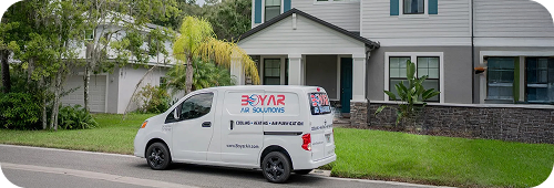 Company van in front of house