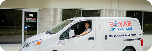 Technician in company van